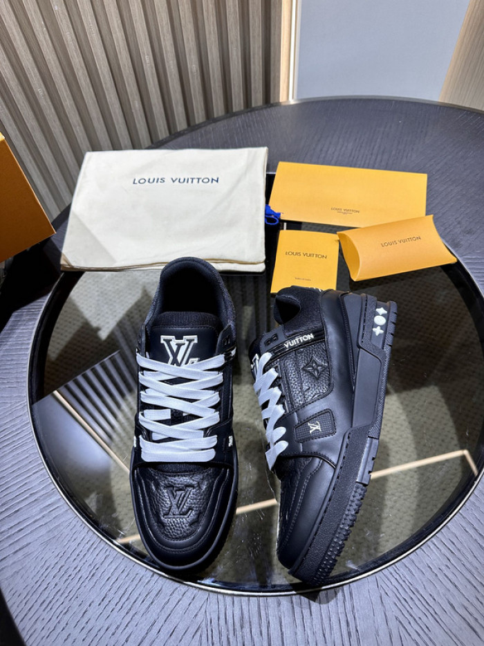 l**is V*t*n trainer black embossed monogram