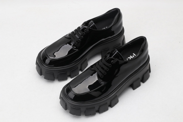 prad patent leather and nylon lace-up shoes